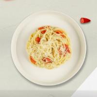 Tia'S Carbonara Pasta · Classic Italian pasta dish made with eggs, Parmigiano-Reggiano cheese, Bacon, and black pepp...