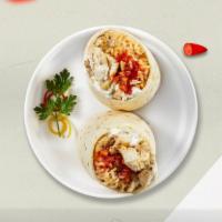 Boyo Pollo Burrito · Grilled chicken topped with sour cream, salsa, cheese, and spanish rice wrapped in a warm to...