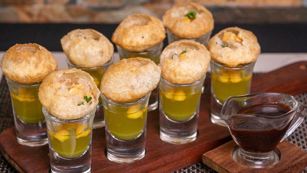 Gol Gappe · Fried flour puffs served with tamarind & mint water
