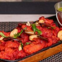 Chicken 65 · Spicy, deep-fried chicken sauteed in traditional spices