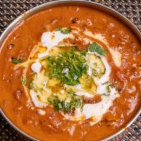 Dal Makhani · Black lentil slow cooked to perfection, enriched with cream & butter