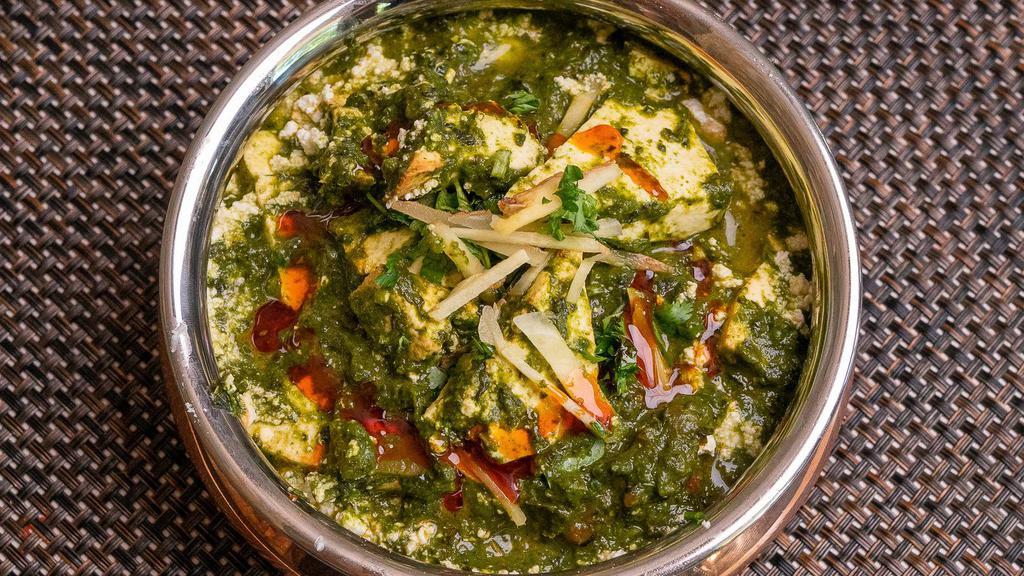 Palak Paneer · Indian cottage cheese delicately cooked in a fresh spinach & fenugreek curry
