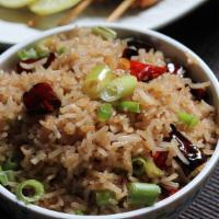 Chilli Garlic Fried Rice · Fried Rice with select vegetables or chicken made with our special chilli garlic sauce