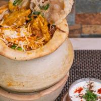 Chicken Biryani · An exotic blend of basmati rice, assorted vegetables and traditional spices and herbs, layer...