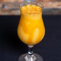 Mango Lassi · Refreshing yogurt drink with mango