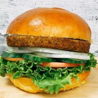 California Veggie Burger · Veggie burger patty,(carrot, peas, broccoli, spinach,corn) brioche burger bun, lettuce, toma...