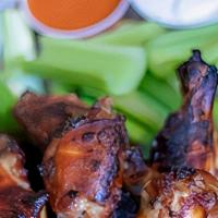 Sticky Chicky · Tossed in House Blend of Asian Barbecue Sauces, cilantro & sesame seeds