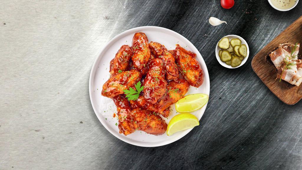 Bee'S Bbq Wings · Fresh chicken wings breaded, fried until golden brown, and tossed in honey and barbecue sauce. Served with a side of ranch or bleu cheese.