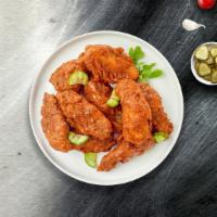 Take The Heat Nashville Wings  · Fresh chicken wings breaded, fried until golden brown, and tossed in Nashville Hot Sauce. Se...
