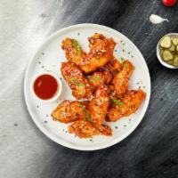 Oriental Special Wings · Fresh chicken wings breaded, fried until golden brown, and tossed in sweet and sour sauce. S...