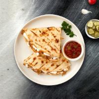 Quesadillas · Cheese wrapped in a grilled tortilla