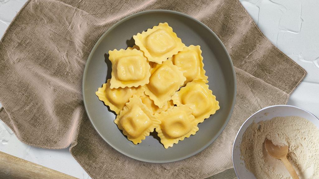 Custom Ravioli · Fresh cheese ravioli cooked with your choice sauce, protein, and toppings.