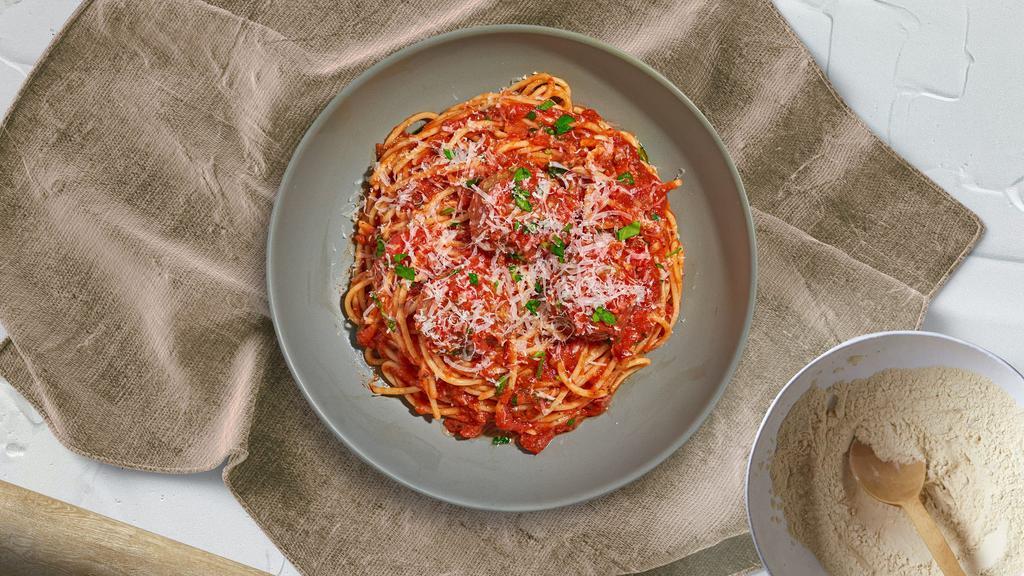 Spaghetti With A Chance Of Meatballs · Al dente spaghetti in our house made garlic marinara sauce paired with meatballs and topped with cheese.