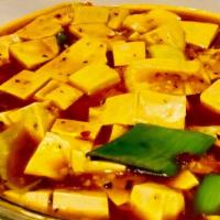 Ma Po Tofu · Spicy. Famous Dish in Sichuan, Cubes Tofu wrapped in Thick Chili Oil.