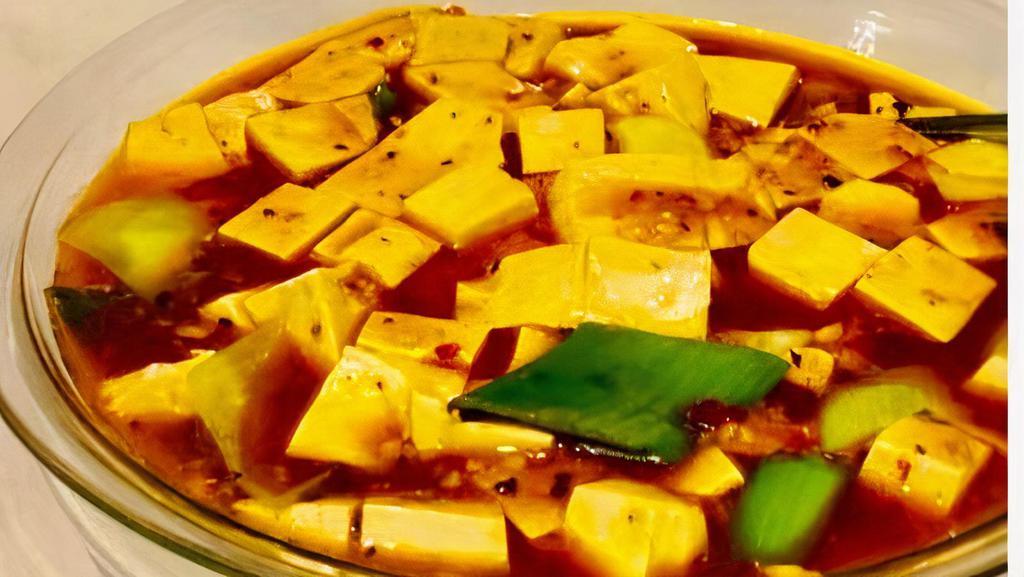 Ma Po Tofu · Spicy. Famous Dish in Sichuan, Cubes Tofu wrapped in Thick Chili Oil.