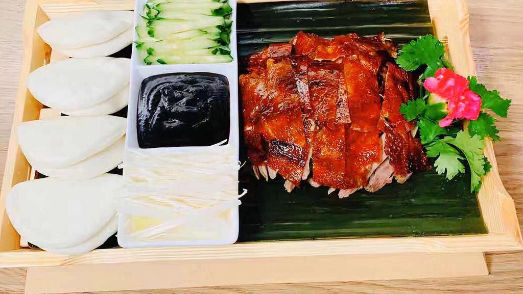 Peking Duck In Two Styles · Crispy Skin, Duck Slices w/cucumber and hoisin Sauce come along with Duck Soup. 
Half for $30.00, $78 for Whole