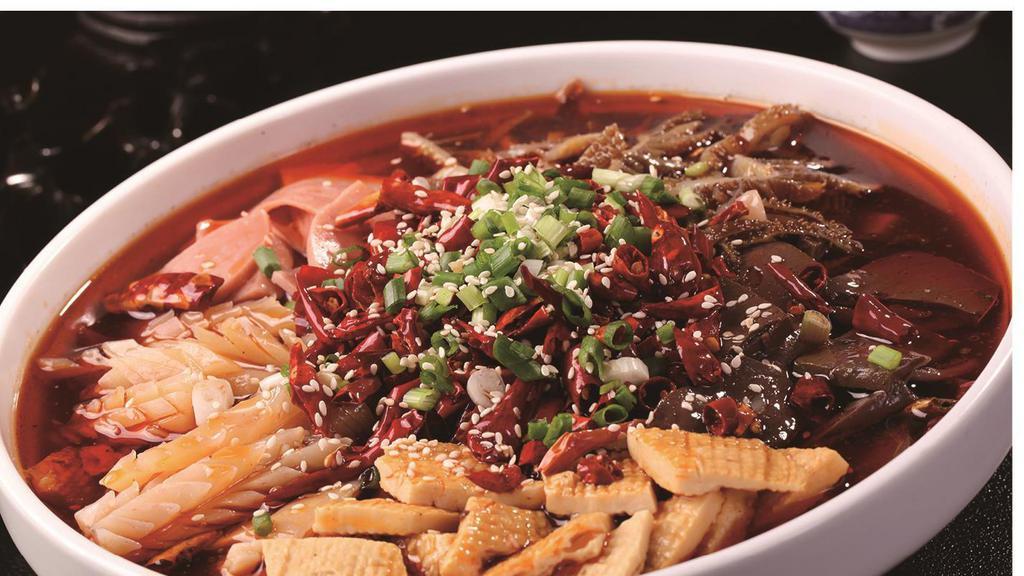 Chong Qing Duck Blood W/Chili Oil · Hot. duck blood and beef triples are the main sources of this dish, the beef tripe is super crunchy, but the duck blood is very nutritious and soft. with the hot chili oil the dish is full of savory flavors. this dish is a traditional Chongqing cuisine.
