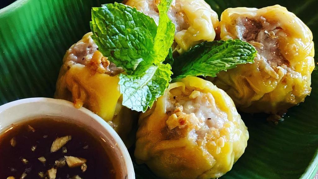 Steam Thai Dumpling · Stuffed with mince pork and shrimps  serve soya sauce.