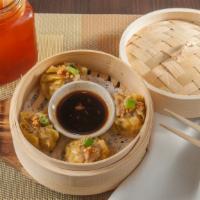 Steam Dumpling · Steamed dumpling with soy vinaigrette.