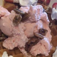 Waffle Sundae · With chocolate, vanilla or strawberry ice cream, walnuts and whipped cream.