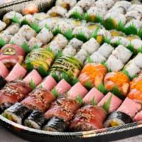 Combo Platter Rolls (14) · 4 specialty rolls, 6 regular fish rolls, 4 regular vegetable rolls.