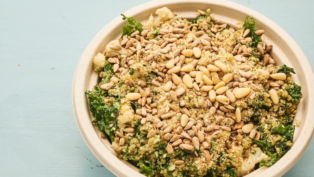 Pesto Bowl · Vegan and gluten-free. Cauliflower, quinoa, pesto, kale, pine nuts, spicy sunflower seeds, and almond Parmesan.