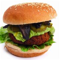Guacamole Burger · Vegan. Pretzel bun, sweet potato-black bean-quinoa patty, guacamole, lettuce, Portobello 
