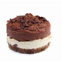 Chocolate Cheesecake · Vegan and gluten-free. Walnut-date base, almond cheese, chocolate hummus, and almond butter.