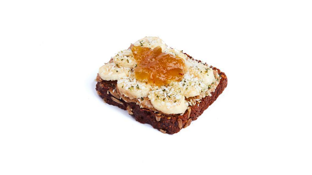 Almond Butter Tartine (1Pc) · Vegan and gluten-free. Almond butter, banana, hempseed, shredded coconut, royal fig jam, and super seed gluten-free bread. 2 pieces.