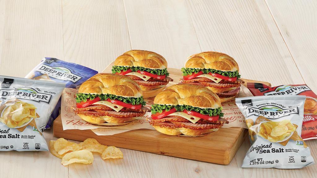 Classic Sandwich 4-Pack · Perfect for folks on-the-go! Try our new Classic Sandwich 4-Pack. It includes your choice of 4 Classic Sandwiches , each with a bag of Deep River Sea Salt Kettle-Cooked Potato Chips. Serves 4.