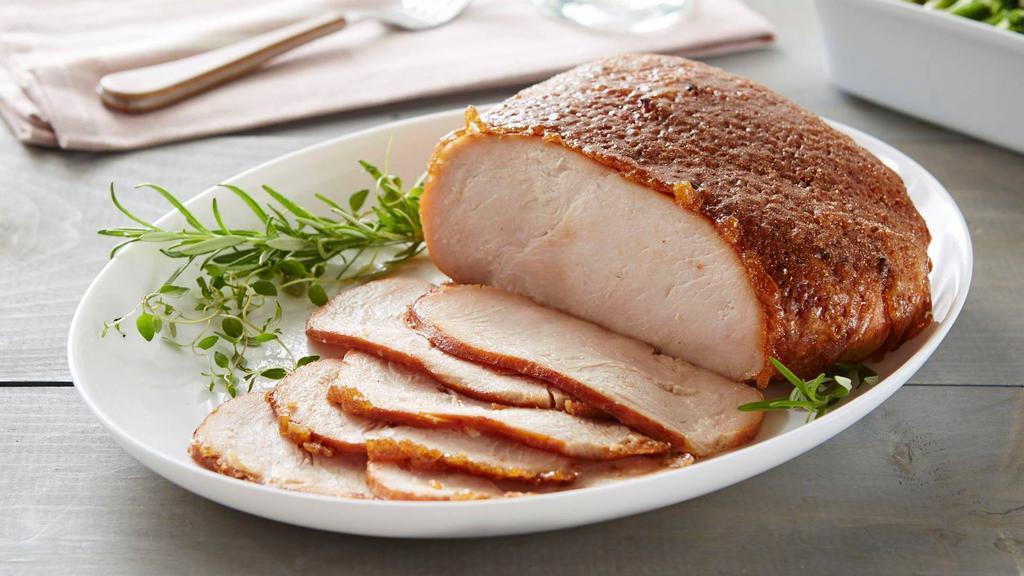 Honeybaked Smoked Turkey Breast · HoneyBaked has changed boring, predictable turkey. You may think you've had turkey before, but if you've never had Honey Baked Turkey Breast, you have a whole new experience in store. Turkey has never tasted so good! Slow-smoked and perfectly seasoned for the most juicy, tender and delicious taste infused into every bite. It's indulgence as its best - everyone loves it. We think you'll agree that this turkey is like no other - and is the World's Best Turkey. Premium 100% white breast meat and hand-crafted in store with our sweet crunchy glaze. Fully cooked, pre-sliced and ready to serve. 2.5 - 3 lbs. Serves 6-8