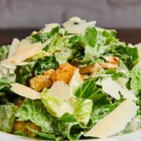 Insalata Di Cesare · Baby lettuce, homemade crostini, shave cheese, and Cesar dressing.