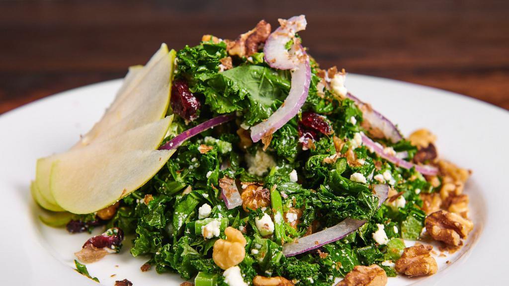 Broccolo And Noci Insalata · Kale salad, goat cheese, cranberry, nuts, onions, and pears.