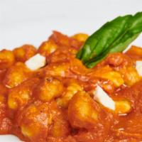 Gnocchi Alla Sorrentina · Tomato sauce. Mozzarella, Parmesan, basil.
