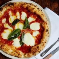 Bufala D.O.P Pizza · San marzano tomato, bufala mozzarella d.o.p, basil, and extra virgin olive oil.