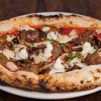 Polpettina Pizza · Cherry tomato sauce, eggplant, meatballs, fresh mozzarella, ricotta, and basil.