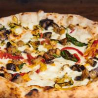 Vegetariana Pizza · Fresh mozzarella, grilled market veggies, eggplant, zucchini, wood roasted peppers, and basil.