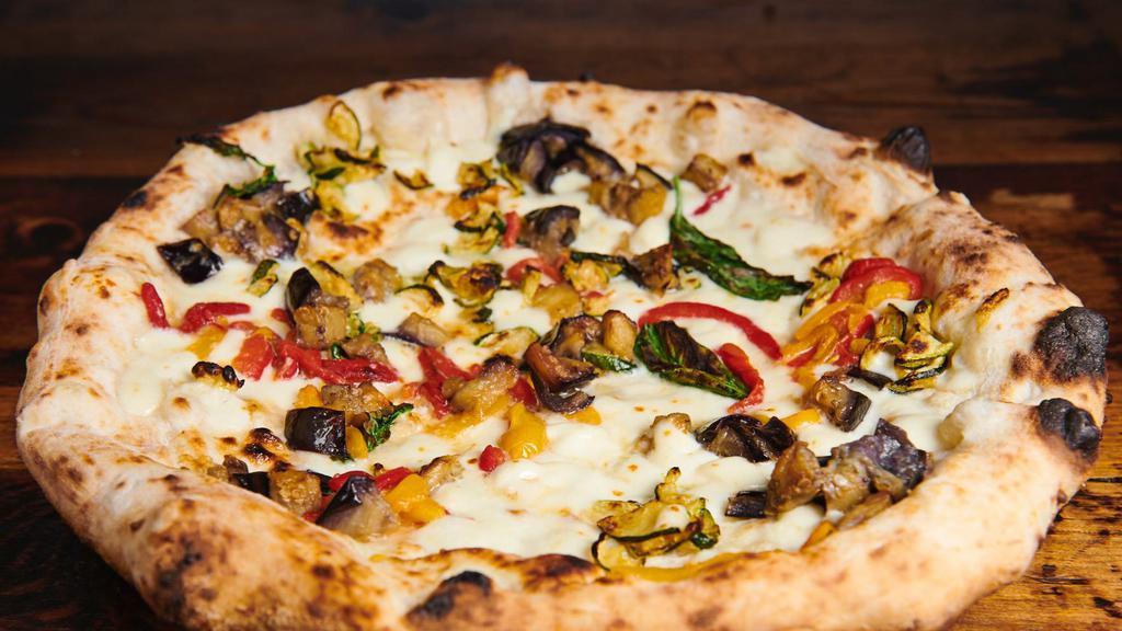 Vegetariana Pizza · Fresh mozzarella, grilled market veggies, eggplant, zucchini, wood roasted peppers, and basil.