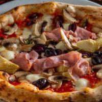 Capricciosa Pizza · San marzano tomato, fresh mozzarella, ham, mushrooms, black olive, artichokes, and basil.