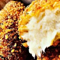 Chicken Croquette · Breaded chicken croquette fried to perfection.
