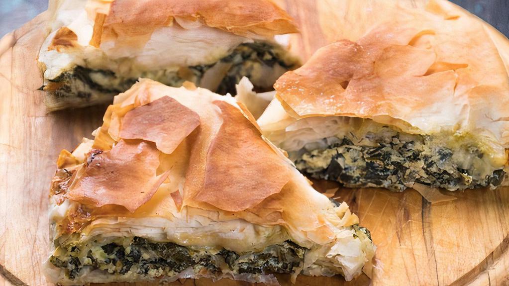 6 Pcs Spanakopita · Crispy baked phyllo wrapped in flaky phyllo dough stuffed with spinach and a blend of cheese with pink sauce.