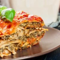 Spinach And Ricotta Lasagna · Freshly prepared by order with layers of pasta, ricotta, parmesan, cheddar, cheddar, mozzare...