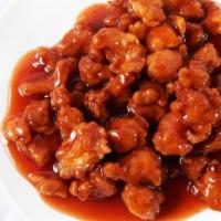 Orange Flavored Chicken · Hot and spicy. Tender filets of marinated chicken delicately sautéed and seasoned with orang...