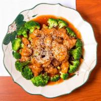 Sesame Chicken · Marinated chicken deep fried sauteed with special sauce and sesame seeds with steamed brocco...