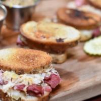 Mini Reubens · Corned beef, swiss cheese, sauerkraut, thousand island dressing, whole grain mustard.