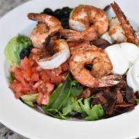Cobb Salad · Grilled chicken, avocado, blue cheese, bacon, olives, eggs, tomatoes, field greens, sherry-s...