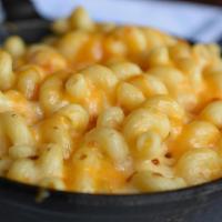 Killer Mac And Cheese · Corkscrew pasta, four cheese sauce, and bread crumb crust.