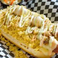 Perro Regular · Regular hot dog. Served with Mozzarella cheese, bacon, smashed potato chips, quail egg, pink...