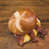 Bacon, Egg And Cheese Sandwich · Crispy bacon and two fried eggs topped with melted cheese of your choice