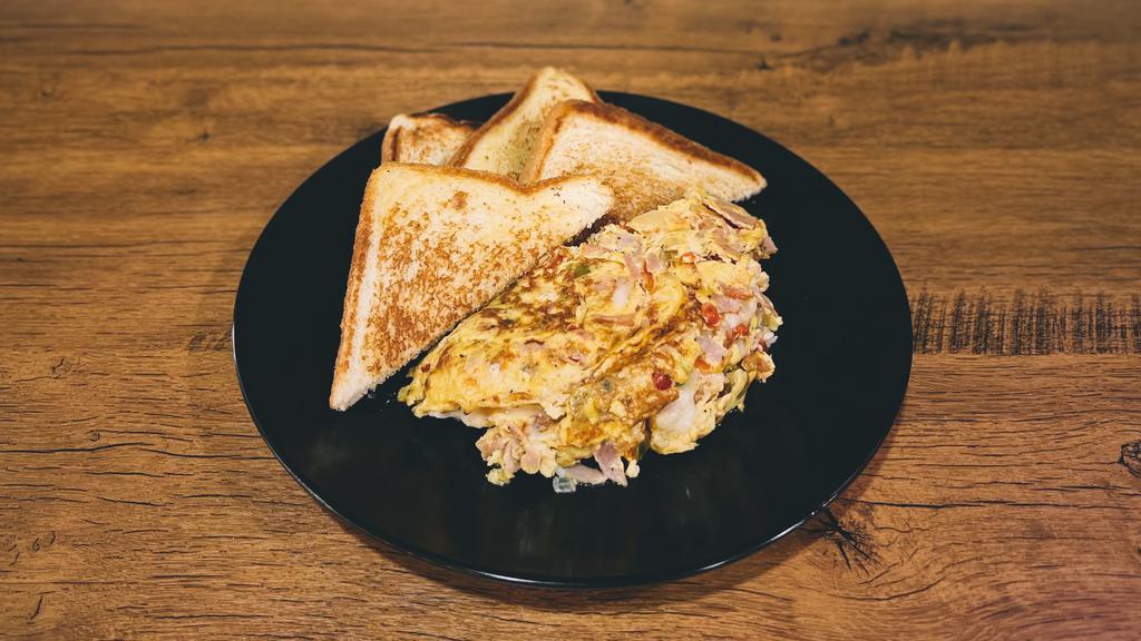 Build Your Own Omelet · Make it your way! Select from our variety of ingredients. Served with toast.